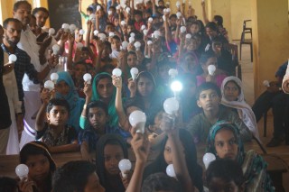 Children with their led bulbs.jpg