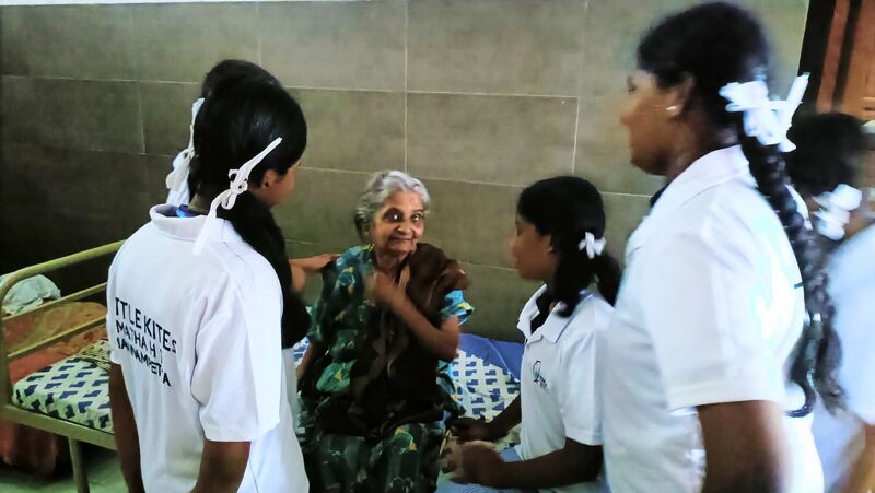 പ്രമാണം:22071-TSR-oldagehomevisit lkstudents2.jpg