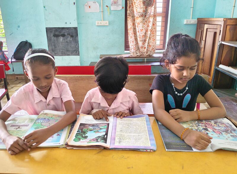 പ്രമാണം:33410 readingtime.jpeg