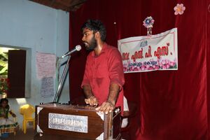 41409 November 1 Sairam sings.JPG