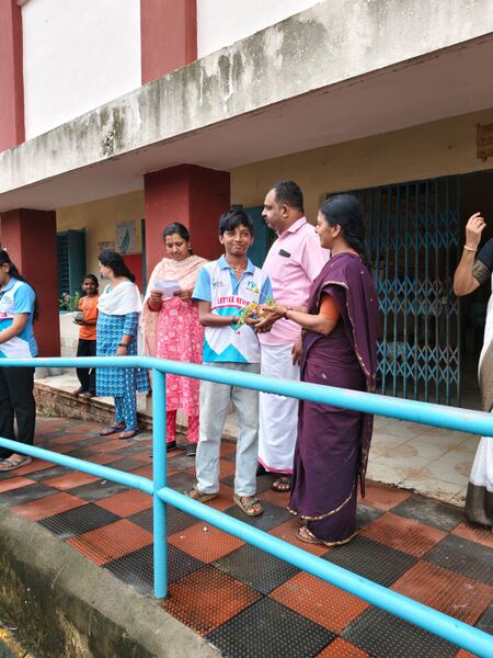 പ്രമാണം:DONATING PLANT TO SCHOOL.jpg