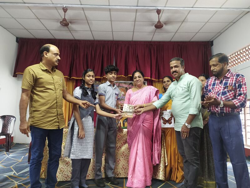 പ്രമാണം:26076 Reading day4.jpg