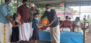 PRAVESHANOLSAVAM BOOK DISTRIBUTION3.jpg