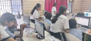 26084 robotics class for X students.jpg