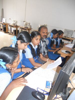 Students of st.Agnes HS,Chavara engaged in digitalization project of ramachandravilasom.JPG