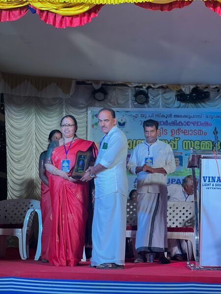 പ്രമാണം:18744 varshikam 2.jpg