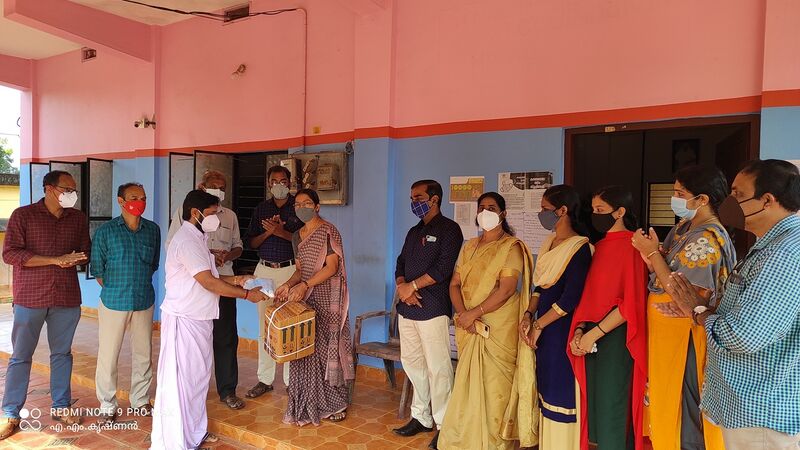 പ്രമാണം:SANITISER MASK RAJAN.resized.jpg