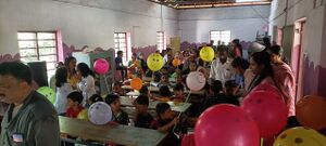 Students enjoying pravesanolsavam.jpeg