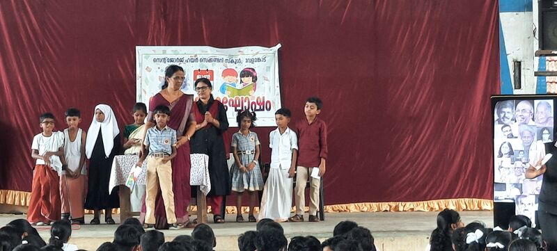 പ്രമാണം:47026-reading day8.jpg