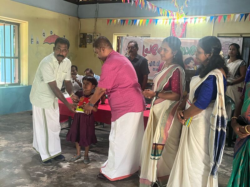 പ്രമാണം:Book Distribution to all.jpg