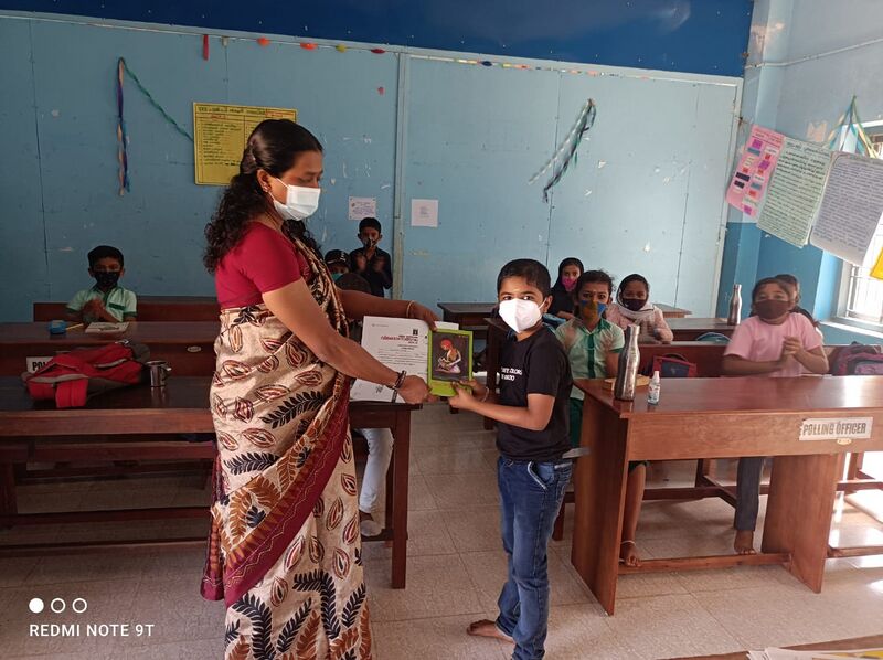 പ്രമാണം:13910 akshramuttam 1 (copy).jpeg