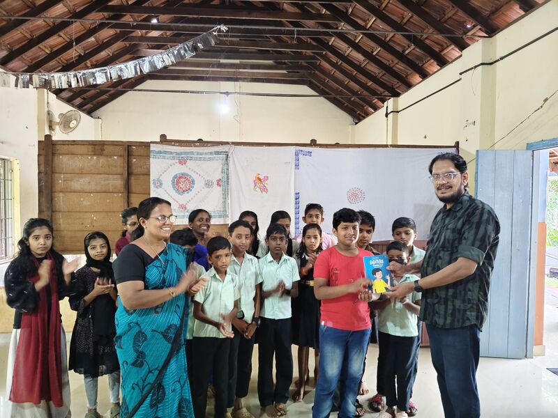 പ്രമാണം:13444 READINGDAY25 KNR2.jpg