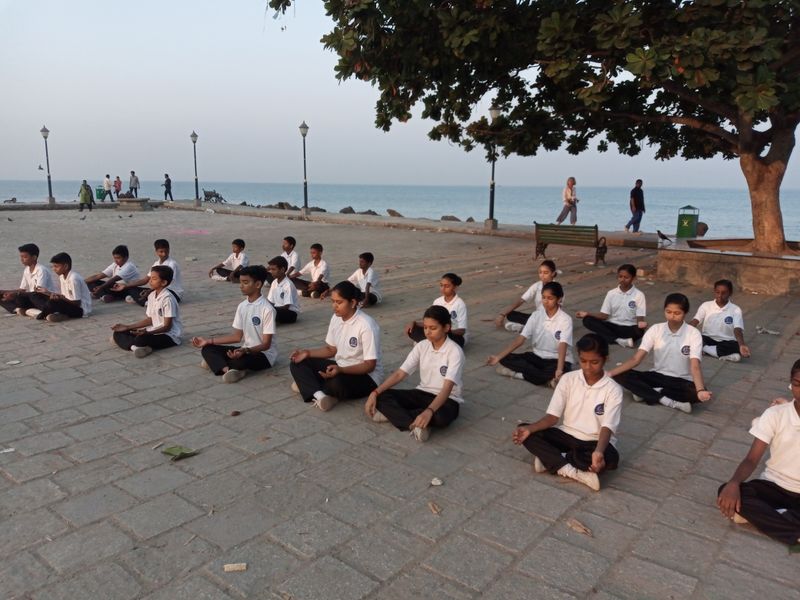 പ്രമാണം:Yoga at Beach.jpg