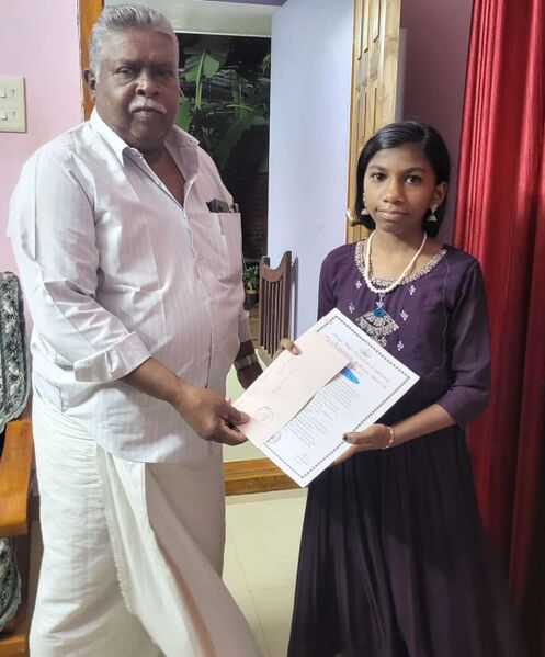 പ്രമാണം:41048 reading competition.jpeg