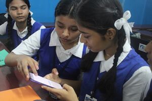 21001 children with phone.JPG