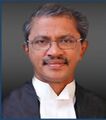 Justice K Harilal, Judicial Member, Armed Forces Tribunal,Kochi.(Former Judge, High Court of Kerala)