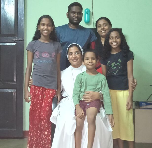 പ്രമാണം:26038 house visiting.jpeg