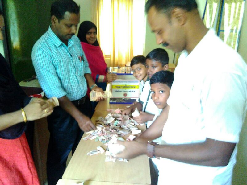 പ്രമാണം:Karunya sparsham childrens contribution.jpg