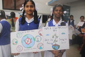 21001 children with poster.JPG