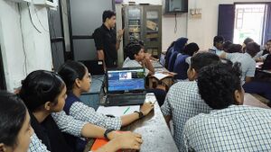 17058 projecter studying in camp.jpeg