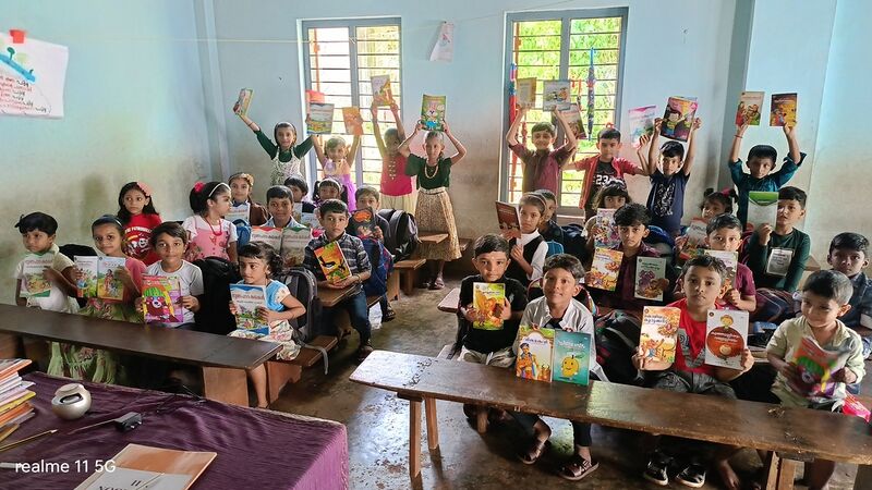 പ്രമാണം:11472-reading day book.jpg