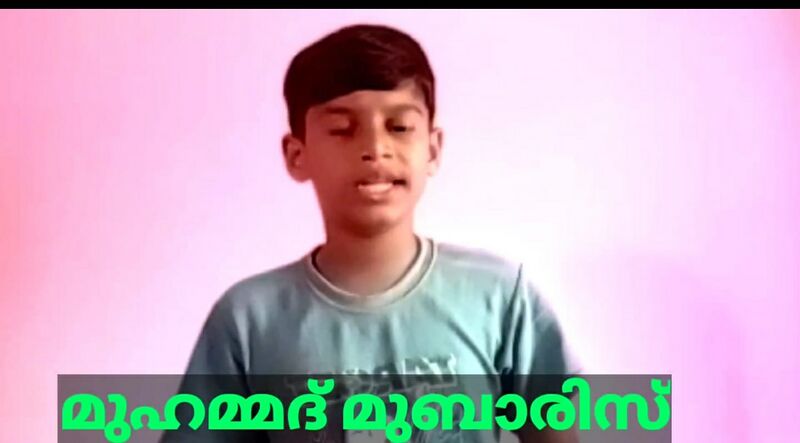 പ്രമാണം:14871 2022 newsreading 2 Mubaris.jpeg