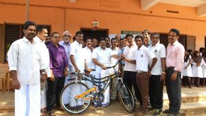 Cycle awarde to Afshan.jpg