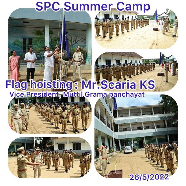 പ്രമാണം:Summer camp flag hosting.jpg