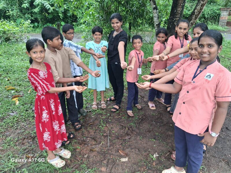 പ്രമാണം:23064 environment day seed ball.jpg