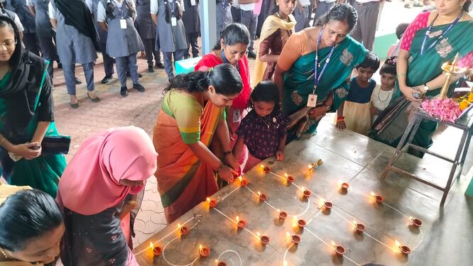 അക്ഷരദീപം തെളിയിക്കൽ